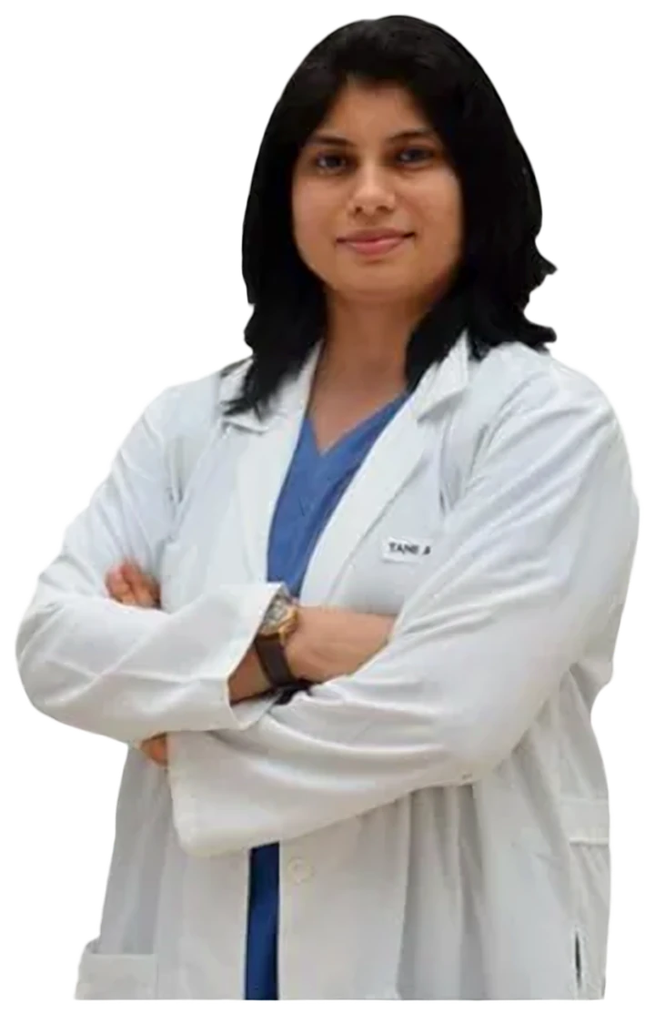 Dr. Neema Bhat in a white coat